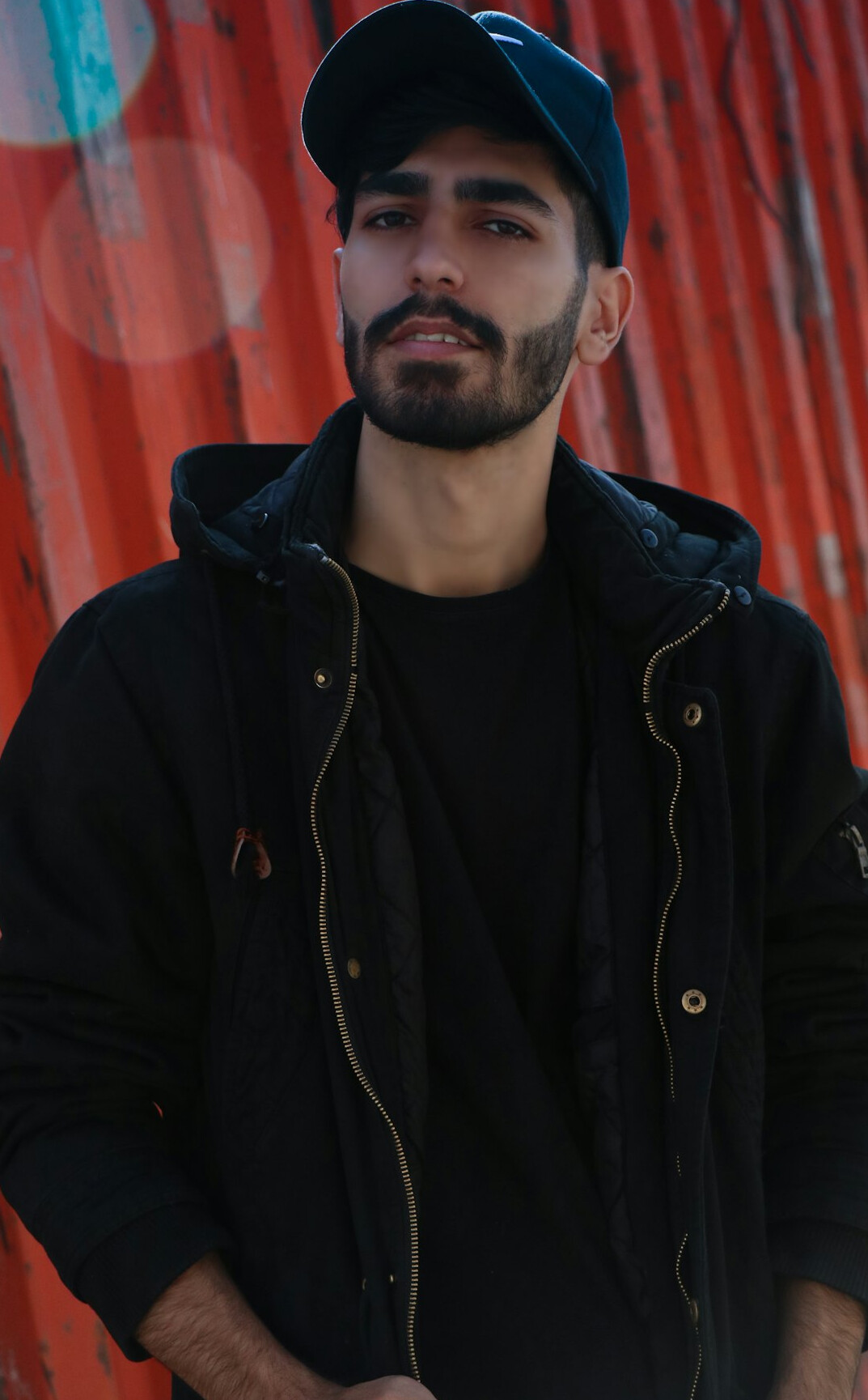 Portrait of a bearded man in a dark jacket